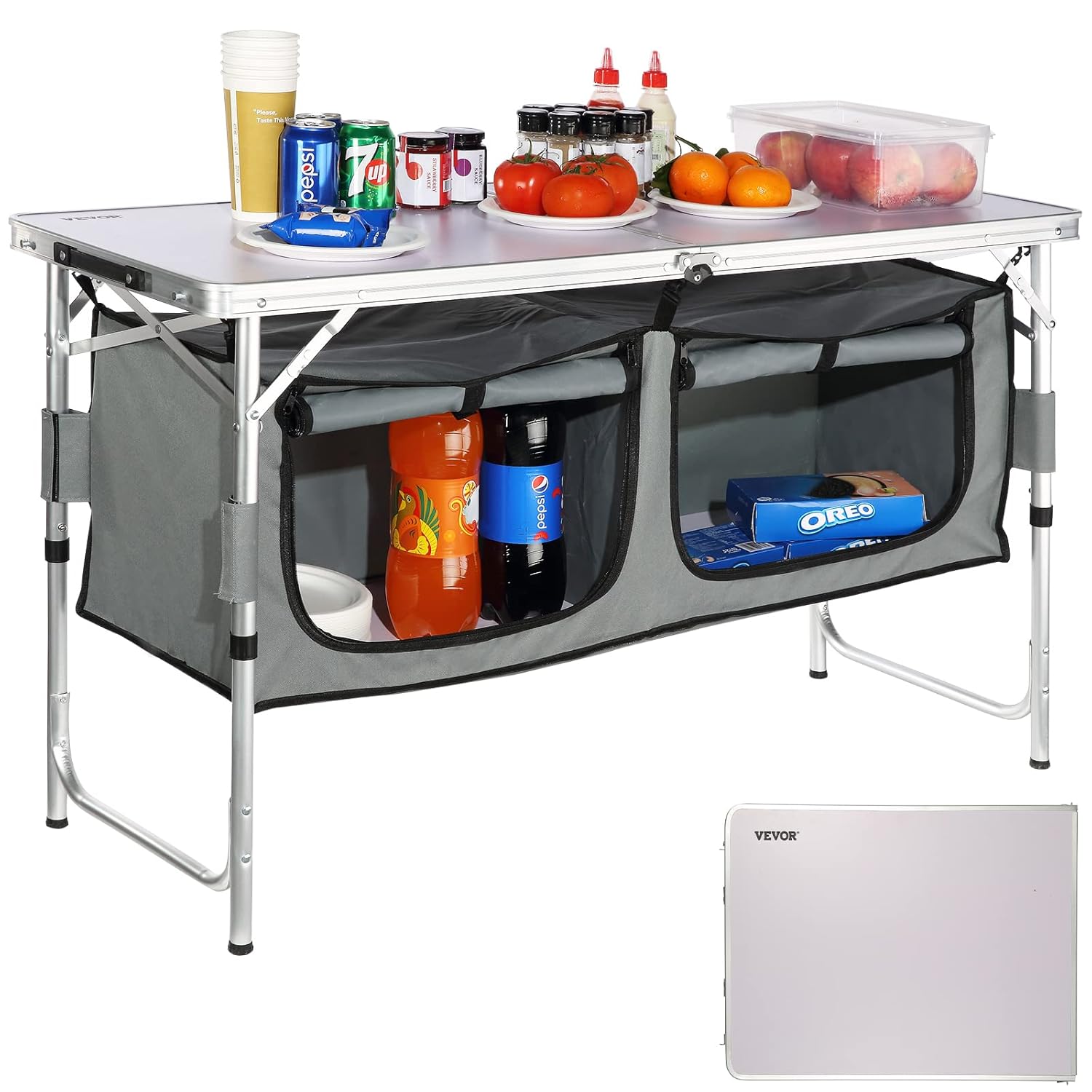 Cuisine camping table with drinks, snacks, and fruits, perfect for outdoor cooking and meal prep.